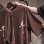 Load image into Gallery viewer, “UP” LETTER TEE IN COFFEE BROWN

