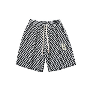 ALLOVER PLAID PATCHWORK SHORTS